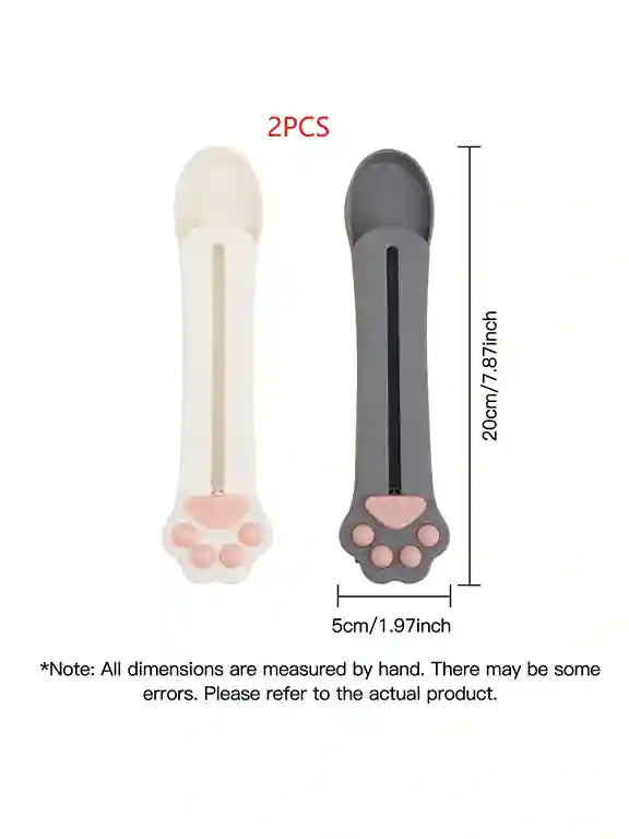 Two silicone pet toys with paw prints, one white and one gray, with measurements on a white background.
