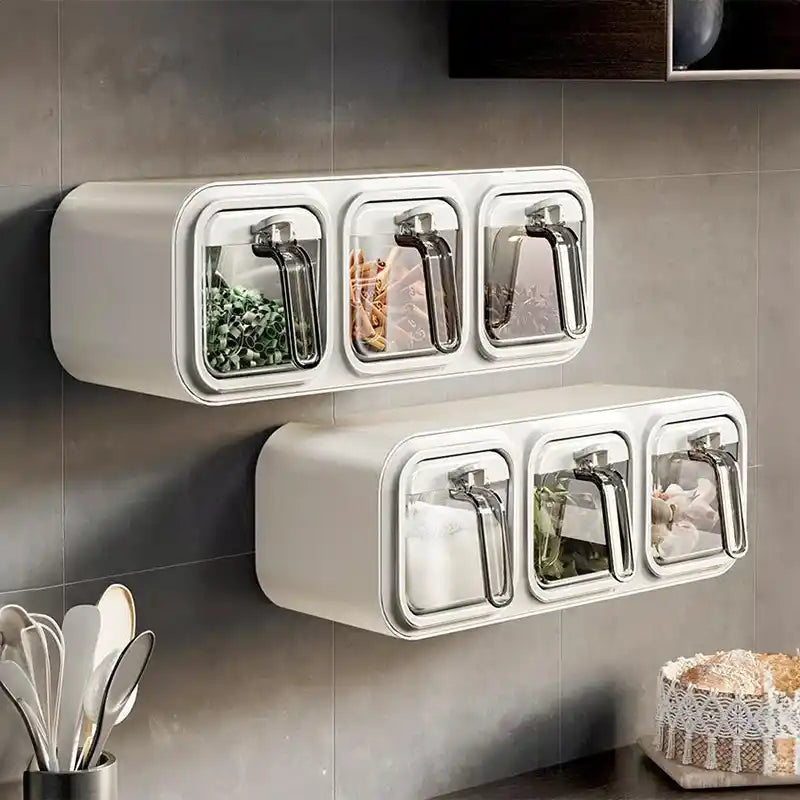 Wall-mounted spice rack with glass containers on a kitchen wall.