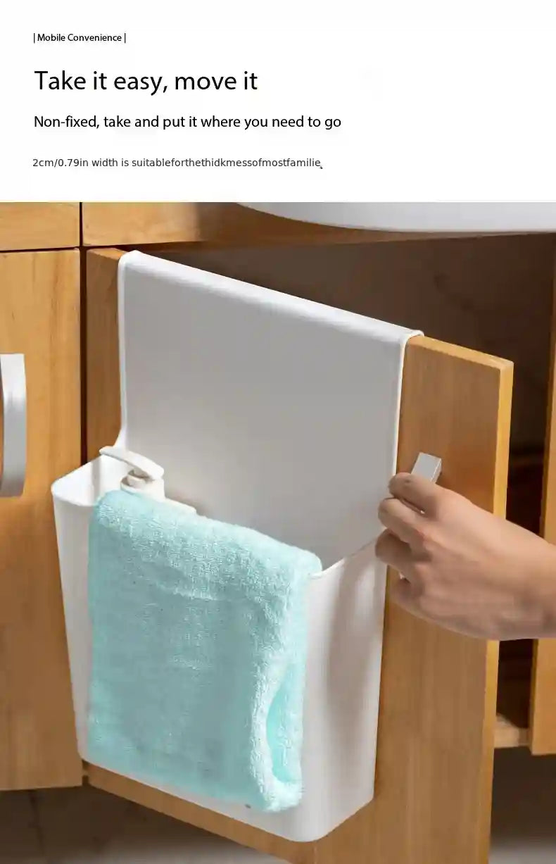 White cabinet organizer with a blue towel inside, attached to a wooden cabinet.