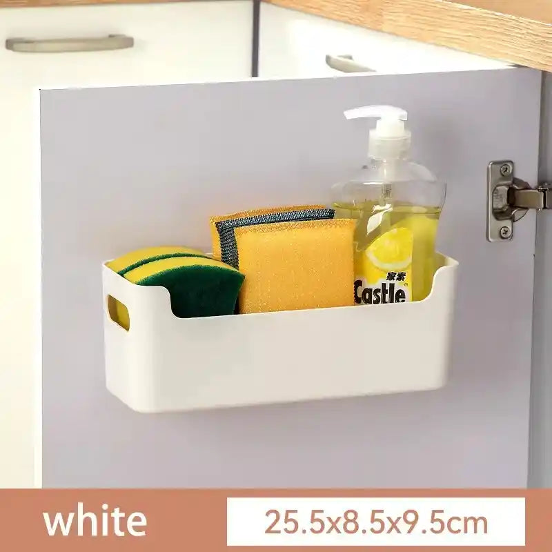 White cabinet organizer with cleaning supplies inside, attached to a kitchen cabinet.
