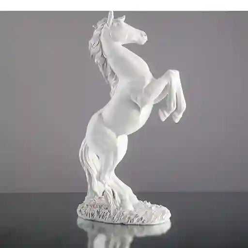 White horse figurine on a gray background