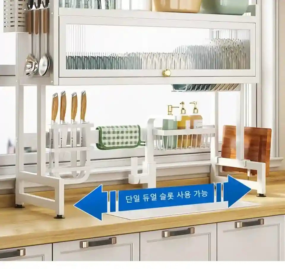 White kitchen rack with utensils and dishes on a wooden countertop.