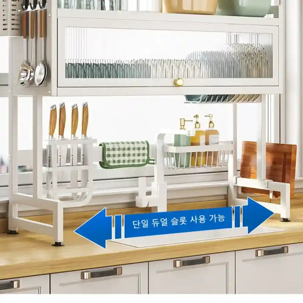 White kitchen rack with various utensils and items on a wooden countertop.