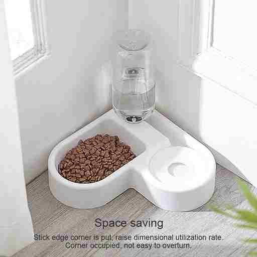 White pet feeder with a glass of water and food on a wooden floor.