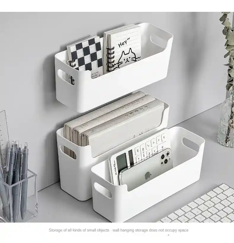 White wall-mounted and desk storage baskets with items on a neutral background