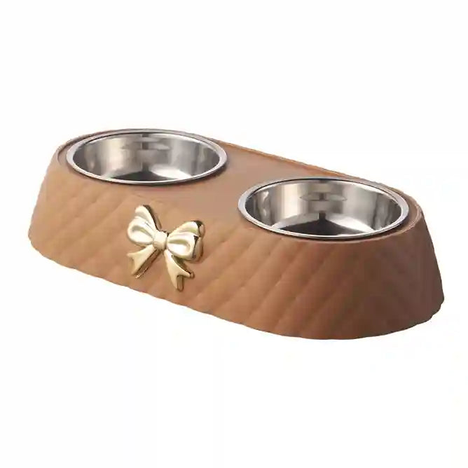 Wooden pet bowl with two stainless steel bowls and a decorative bow on a white background