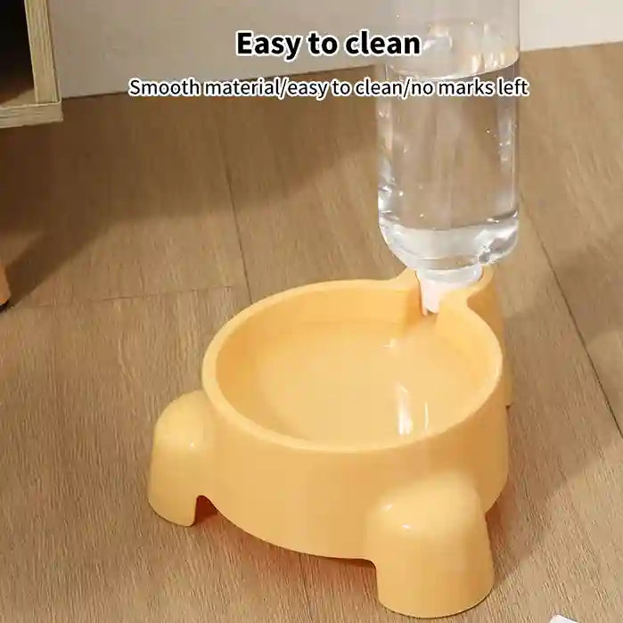 Yellow pet bowl being filled with water on a wooden floor, with text indicating ease of cleaning.
