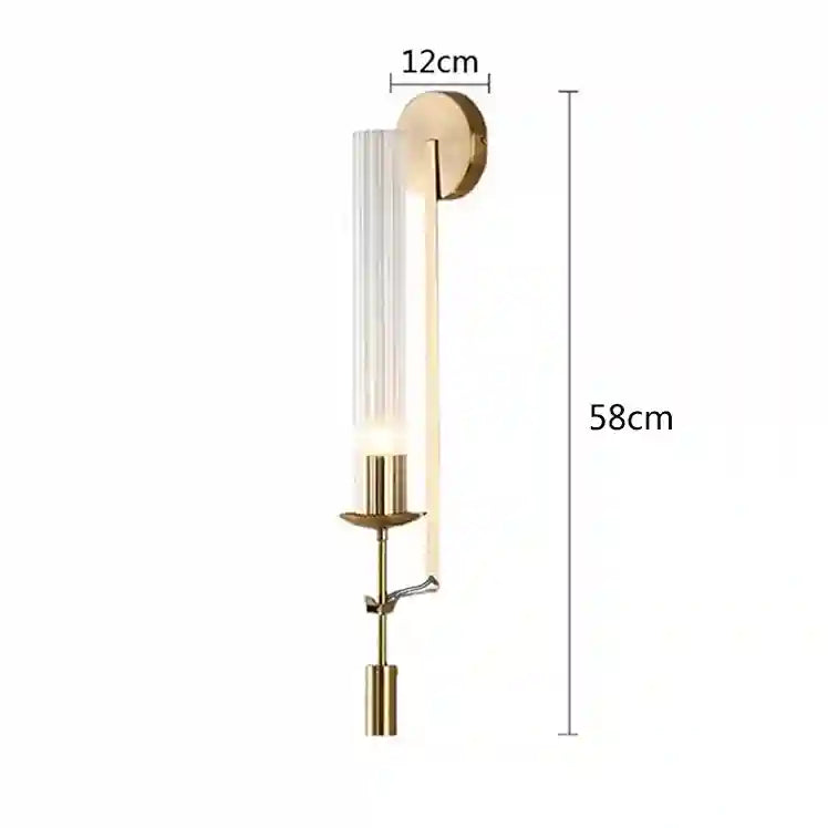 Gold wall sconce with dimensions labeled on a white background